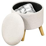 TABOURET REPOSE-PIED DESIGN : Ce repose-pied ou pouf aux lignes épurées apportera une petite touche déco à votre intérieur. Ses pieds en bois contrastent avec le revêtement crème de l'assise