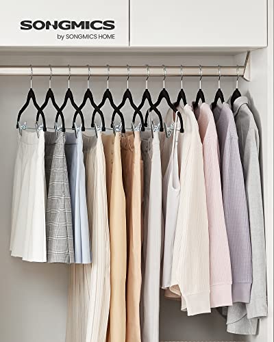 Image of SONGMICS Trouser Hangers, Set of 12 Velvet Hangers with Adjustable Clips, 42.5 cm Long, Non-Slip, Space-Saving, for Skirts, Coats, Dresses, Black CRF12B | Space Saving Hangers for Skirts and Trousers, Non-Slip, Adjustable Clips, Ink Black, BREANNA Collection CRF12B