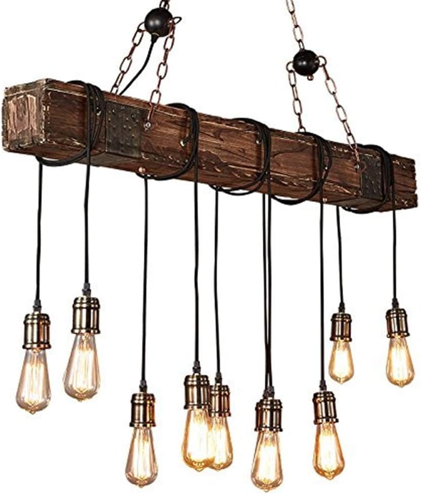 Lustre éclairage plafond restaurant et grand îlot en bois