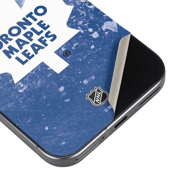 Skinit Decal Phone Skin Compatible with Google Pixel 9a - Officially Licensed NHL Toronto Maple Leafs Frozen Design