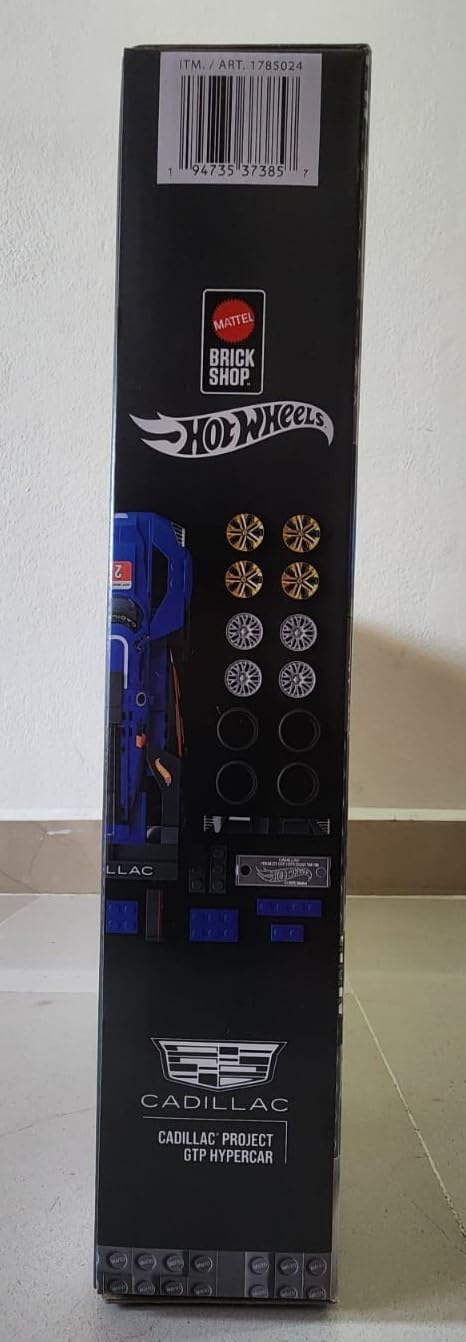 An overhead view of all the building pieces and accessories laid out for both the Cadillac and Corvette models, organized for assembly.