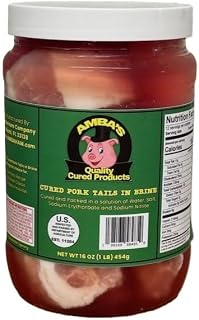 Cured Pork Tail Pieces In Brine 32oz Jar, (Net Wt 16oz/1lb of Product) Cut Into Pieces, Used For Jamaican Stew Peas With Pig Tails Recipe Along With Other Caribbean Cuisine Favorite Dishes. Amba's Quality Cured Products
