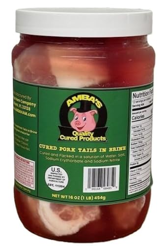 Cured Pork Tail Pieces In Brine 32oz Jar, (Net Wt 16oz/1lb of Product) Cut Into Pieces, Used For Jamaican Stew Peas With Pig Tails Recipe Along With Other Caribbean Cuisine Favorite Dishes. Amba's Quality Cured Products