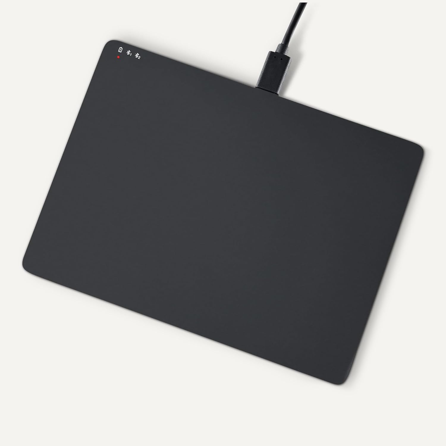 Amazon Basics Multi-Touch Trackpad connected to USB-C charging cable
