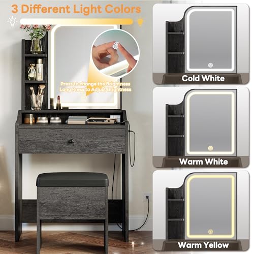 Image of LIKIMIO Small Vanity Desk with Mirror Lights and Storage Stool | Charcoal grey compact vanity with 3 light modes, charging station, storage drawer, 3 shelves and upholstered stool