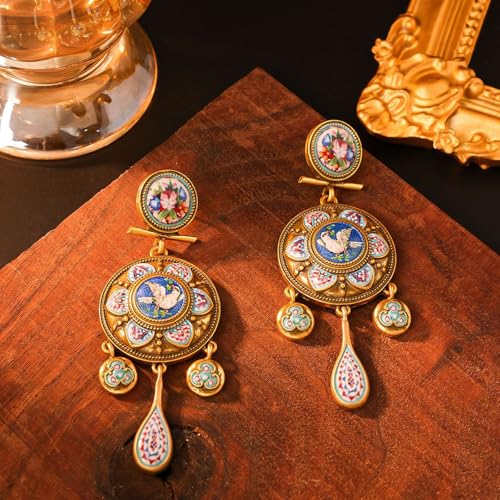Boucles d'oreilles historiques Peace Bird légères pour sublimer un visage sans douleur