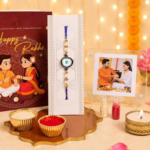 Image of Art Street Evil Eye Rakhi Gift Hamper with Personalized Acrylic Photo Frame, Evil Eye Rakhi, Greeting Card, Roli Chawal & Premium Gift Box | Raksha Bandhan Gift for Brother