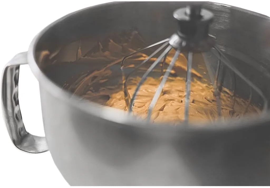 Mixing bowl with whisk attachment in use