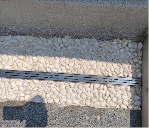Drenaje de zanja con cubierta para evitar charcos en la entrada de patio de hormigón 3