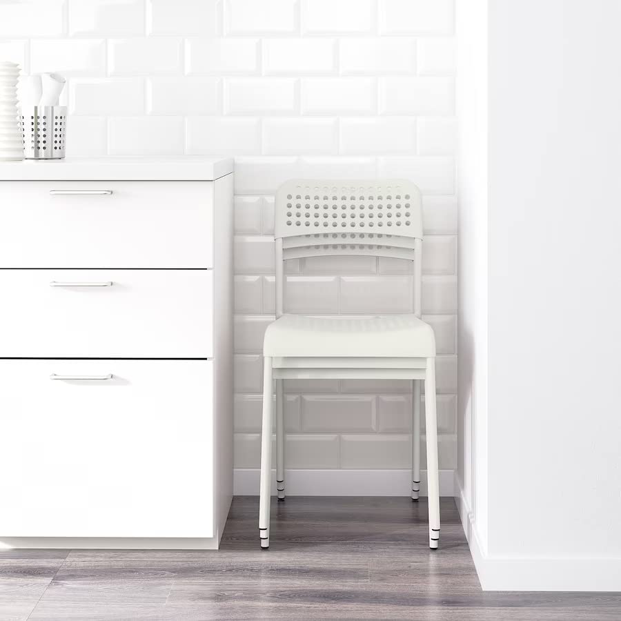 Ikea Steel Modern and Less Space Stacking Chair(White). 1