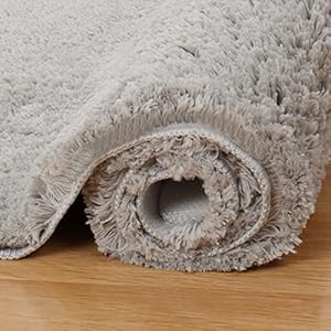 Ezprotekt Tapis de bain antidérapant, doux et confortable à poils longs et épais pour salle de bain, plus facile à sécher, tapis en peluche pour baignoires, douches à pluie et sous l&rsquo;évier, gris foncé