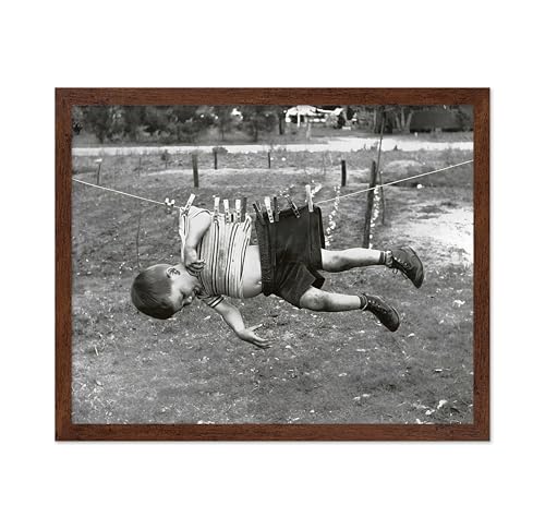 Poster Master Vintage Kid on Clothesline Poster - Retro Hanging Child Print - Photography Art - Humorous Gift for Men, Women, Parents - Funny Decor for Laundry Room, Nursery, 16x20 Brown Framed