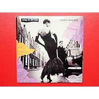 Duffy, Stephen Icing On The Cake 7" 10 TIN3 EX/VG+ 1985 picture sleeve has crease on spine vinyl is mint, as Stephen Tin Tin Duffy