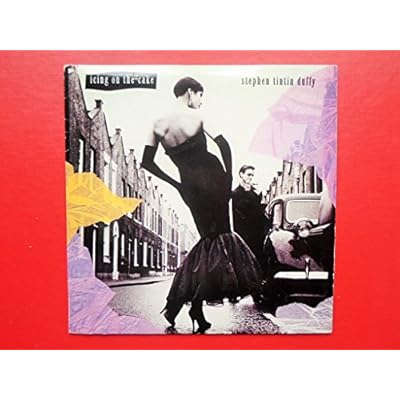 Duffy, Stephen Icing On The Cake 7" 10 TIN3 EX/VG+ 1985 picture sleeve has crease on spine vinyl is mint, as Stephen Tin Tin Duffy