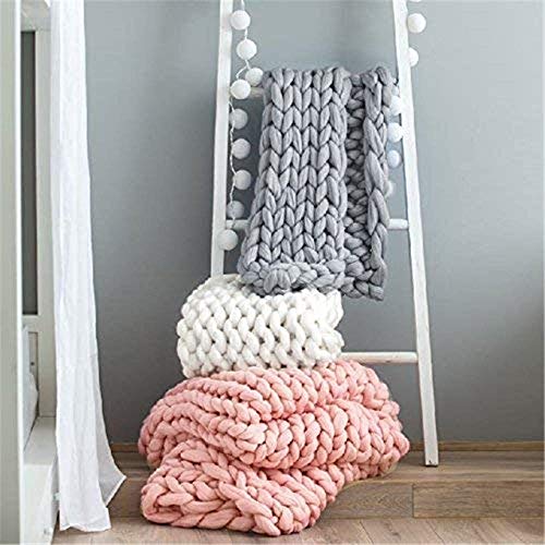 Plaid grosse maille tricoté main pour un canapé ou lit douillet