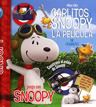 Hardcover Juega con Snoopy - Carlitos y Snoopy - Los libros de la película [Spanish] Book