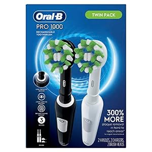 Oral-B Pro 1000 CrossAction Electric Toothbrush, Black and White, 2 Count — photo 6 of 6