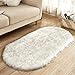 Produktbild Alfombras de piel de oveja de imitación Suave peluda mullida Cubierta de alfombra grande Alfombrillas antideslizantes para silla Cama Sofá Piso con lana extra larga (punta blanca y gris), 60 * 90
