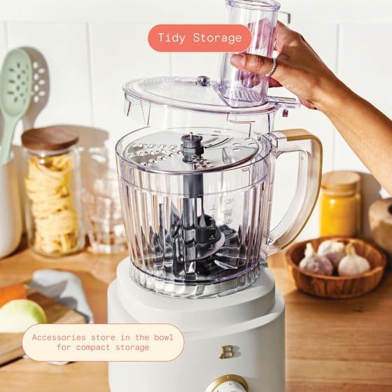 Food processor showing accessories stored compactly inside the bowl