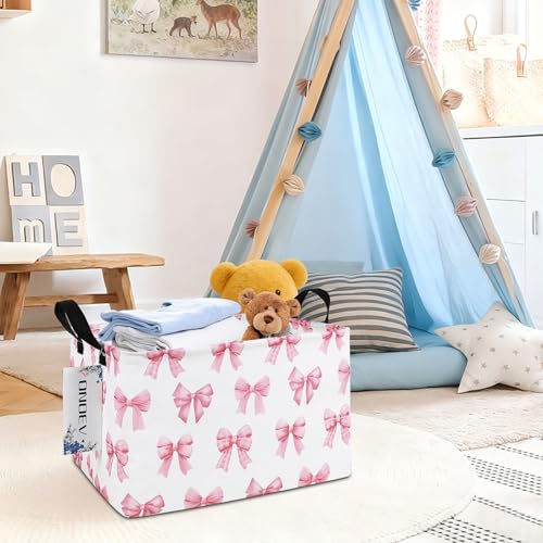 Image of Rectangular Pink Bow Closet Storage Bin, Foldable Clothes Organizer | Moisture-proof premium canvas, reinforced side grips, compact narrow rectangular bin for wardrobe, bedroom, hallway, bathroom