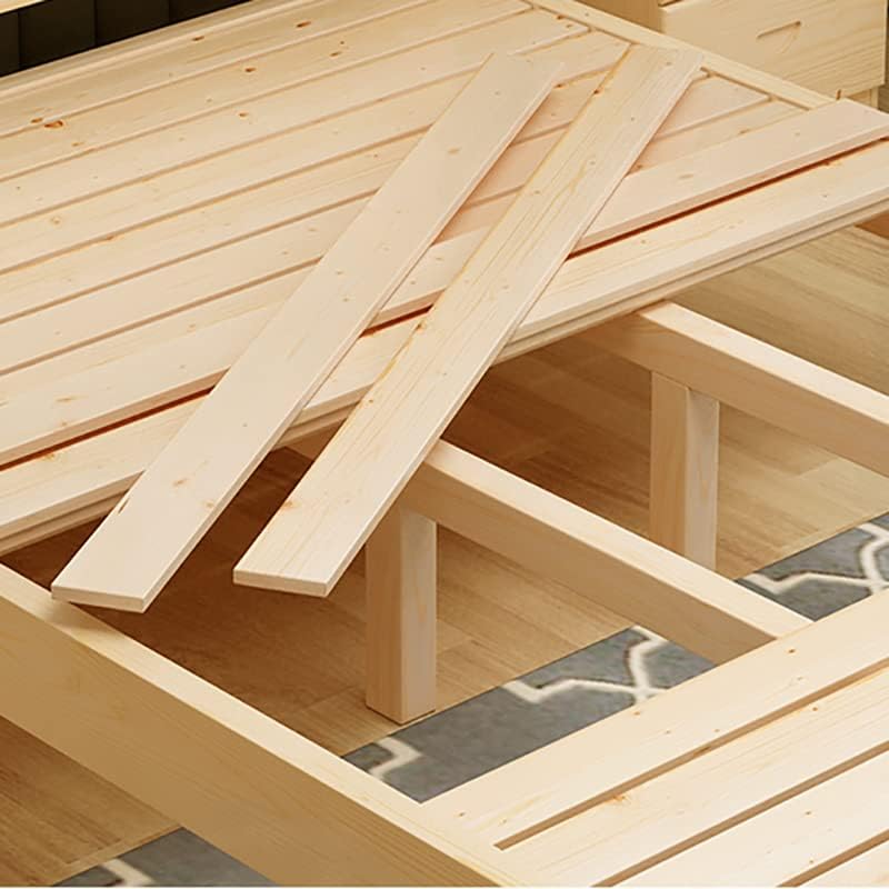 Wooden bed slats being placed on a bed frame