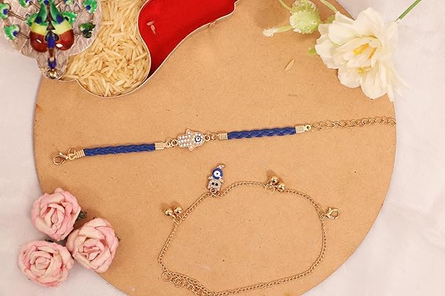 Image of Chocozone Evil Eye Rakhi for Brother & Bhabhi Rakhi Lumba Set for Bhai Bhabhi Rakhi Gifts for Bhai with Roli Chawal & Card Rakshabandhan Gifts for Brother
