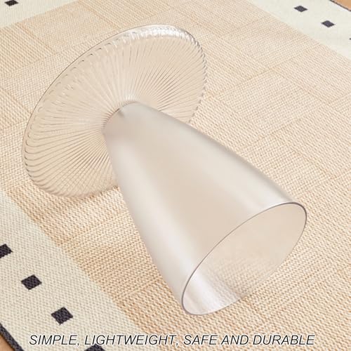Table basse ronde transparente au design en arc arrondi épuré