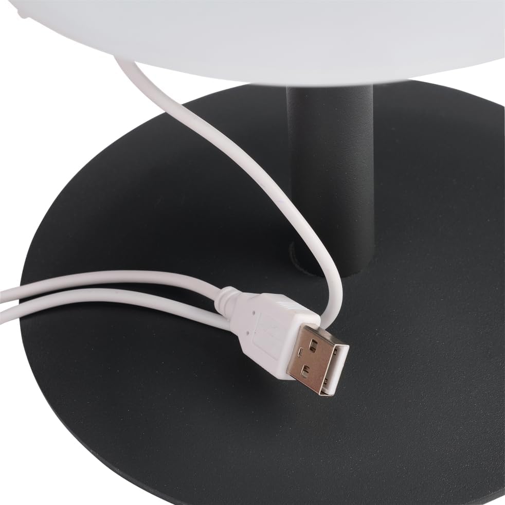 Close-up of the base of the Lumisky Standy Mini Rock lamp showing the USB charging port with a white USB cable connected.