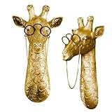 Design originale e distintivo: questa esclusiva scultura da parete a forma di giraffa indossa occhiali eleganti e aggiunge un tocco di umorismo ed eleganza a qualsiasi stanza. Un vero e proprio colpo d'occhio garantito per diventare il centro di ogni intrattenimento.