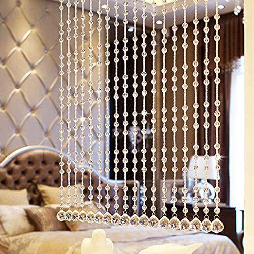 Rideaux de séparation de pièce en cristal pour structurer un studio sans perdre de lumière
