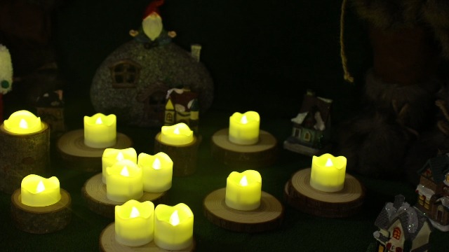 Image of Topstone Green Remote Control Flameless Tealight Candles,CR2450 Battery Powered Votive Candles with Timer,Electric Fake Candle for Home, Christmas Decoration,Pack of 12