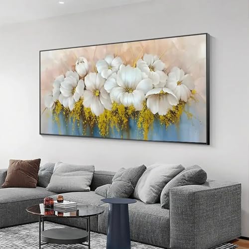 Habillez un mur vide de salon avec ce grand tableau floral blanc encadré 50x100