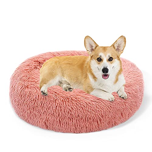 Calming Dog Bed & Cat Bed, Anti-Anxiety Donut Dog Cuddler Bed, Warming Cozy Soft Dog Round Bed, Fluffy Faux Fur Plush Dog Cat Cushion Bed for Small Medium Dogs and Cats (Medium 24''x24'', Pink)