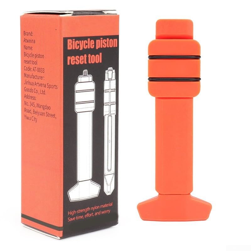 Dispositivo de reinicio del pistón del freno de la bici para los sistemas hidráulicos del disco con la construcción del polímero de nylon y la operación equilibrada de doble lado (naranja)