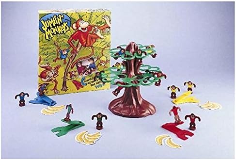 The Jumpin' Monkeys game in action, with several monkeys hanging from the plastic tree branches