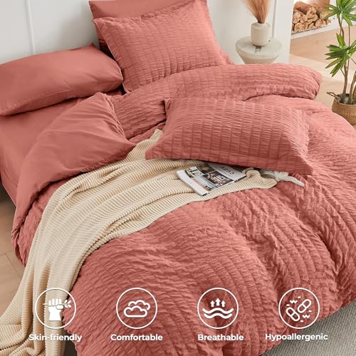 Image of HYMOKEGE Coral Full Size Comforter Sets Seersucker 7 Pieces, All Season Luxury Bed in a Bag for Bedroom, Bedding Set with Comforter, Sheets, Pillowcases & Shams
