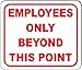 Employees only beyond this point sign business workplace