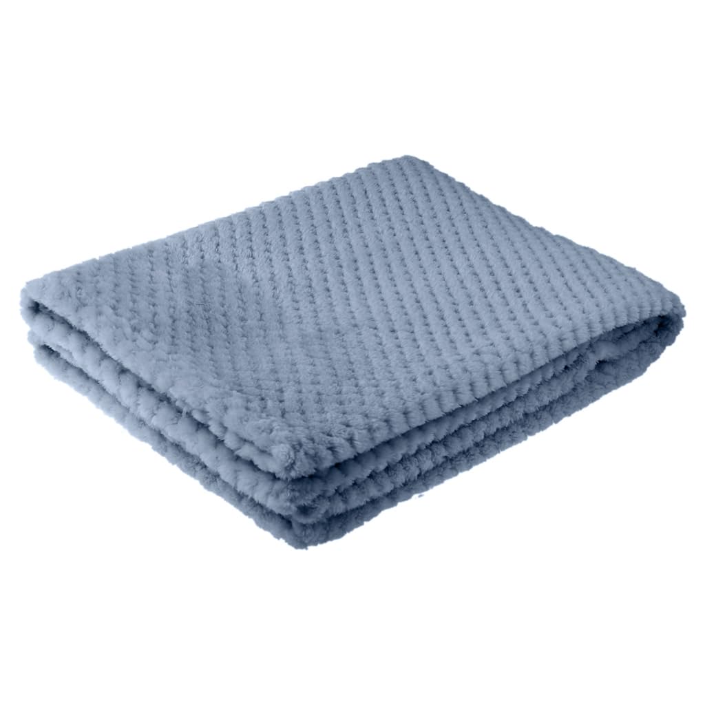 Couverture d winter chaude pour des soirées cocooning sur le canapé