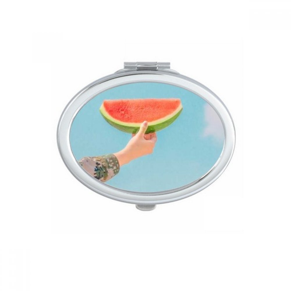 Miroir compact ovale paysage forestier pour retouches maquillage en voyage