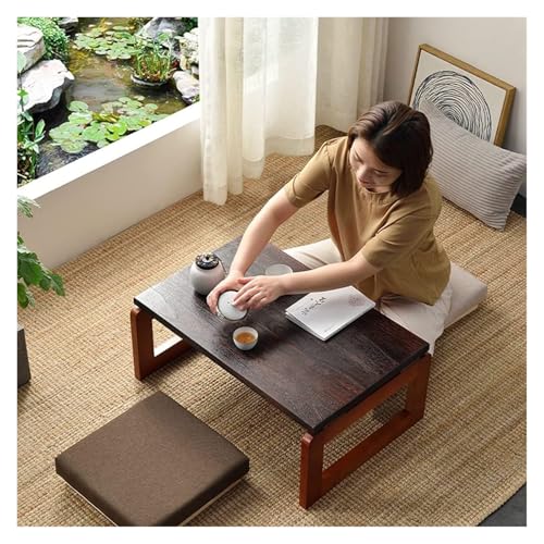 Table basse japonaise pliante pour optimiser un petit salon encombré