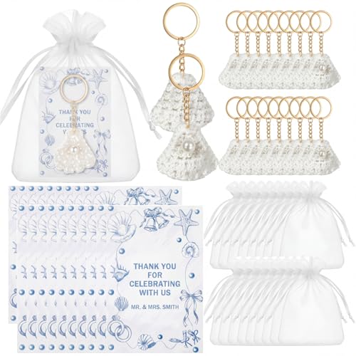 Fournitures de fête EVJF avec ce porte-clés coquillage perle à offrir aux invitées