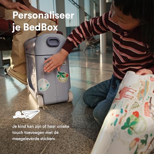 Image of Stokke Jetkids Bedbox - Kids Ride-On Suitcase & Travel Bag, Helps Your Child Relax & Sleep on The Plane, Approved by Airlines, Swivel Wheels, Adjustable Strap - Arctic Blue