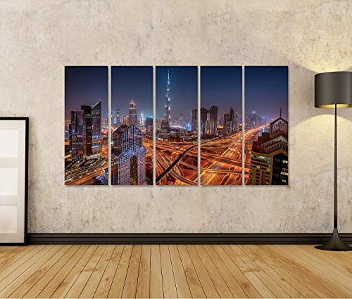 Quadro su tela Dubai skyline durante l'alba