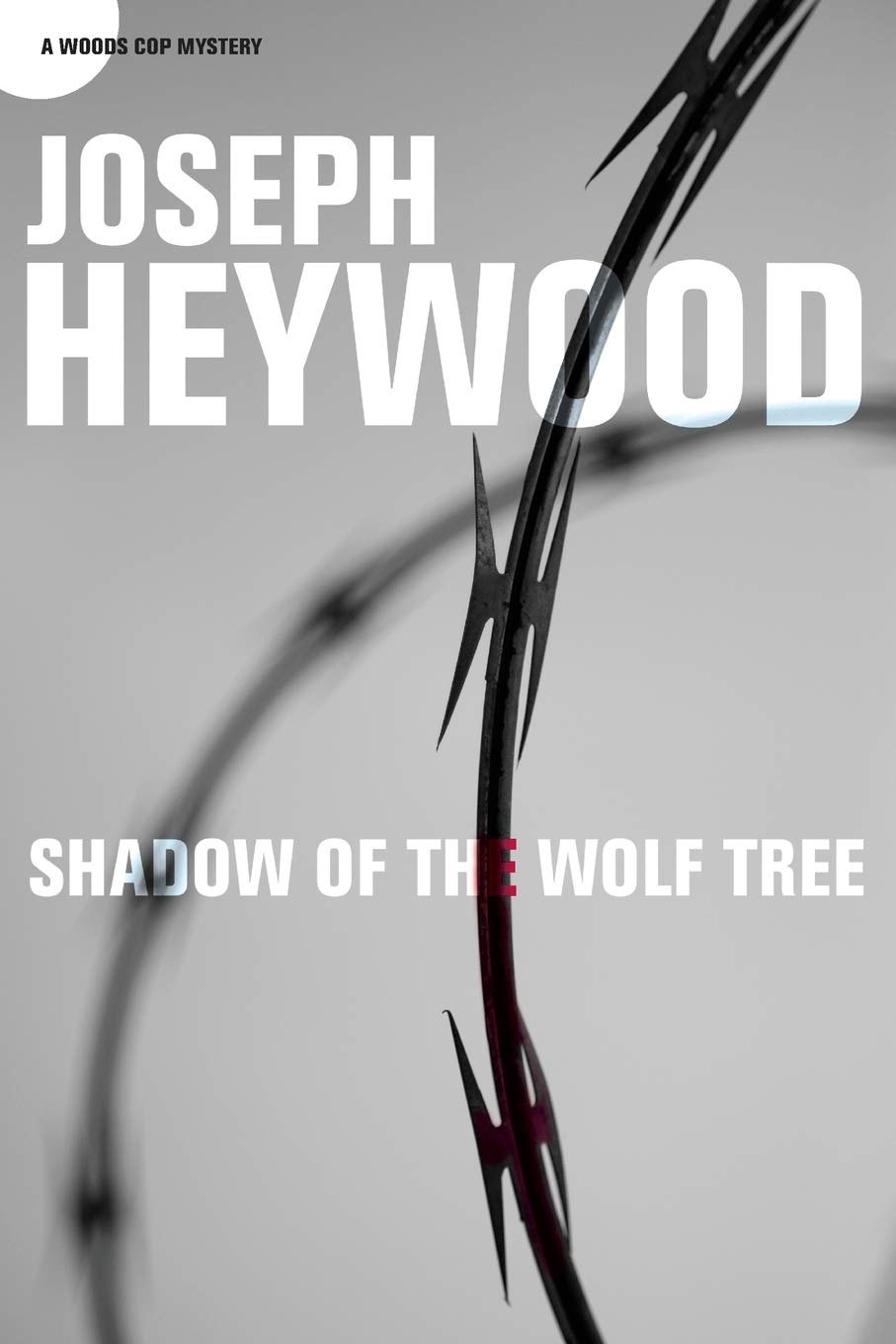 Buy Shadow of the Wolf Tree: A Woods Cop Mystery — BookShops.in