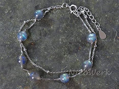 Platte schakelarmband met patroon / zilver - Ellen Beekmans