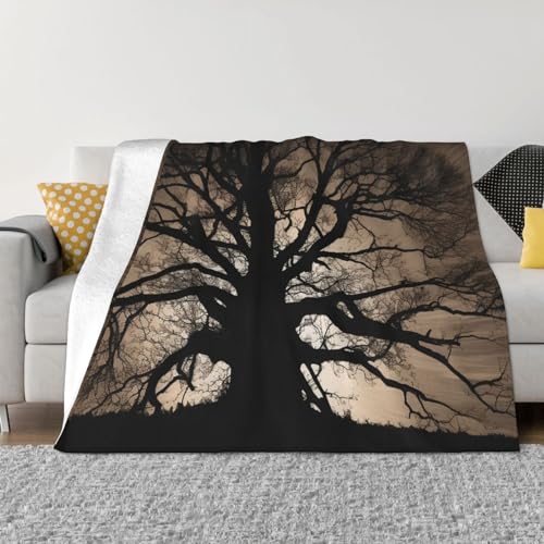 Couverture polaire en flanelle 152x127cm drapée sur canapé