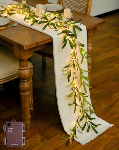 Garland of lighted artificial olive branches