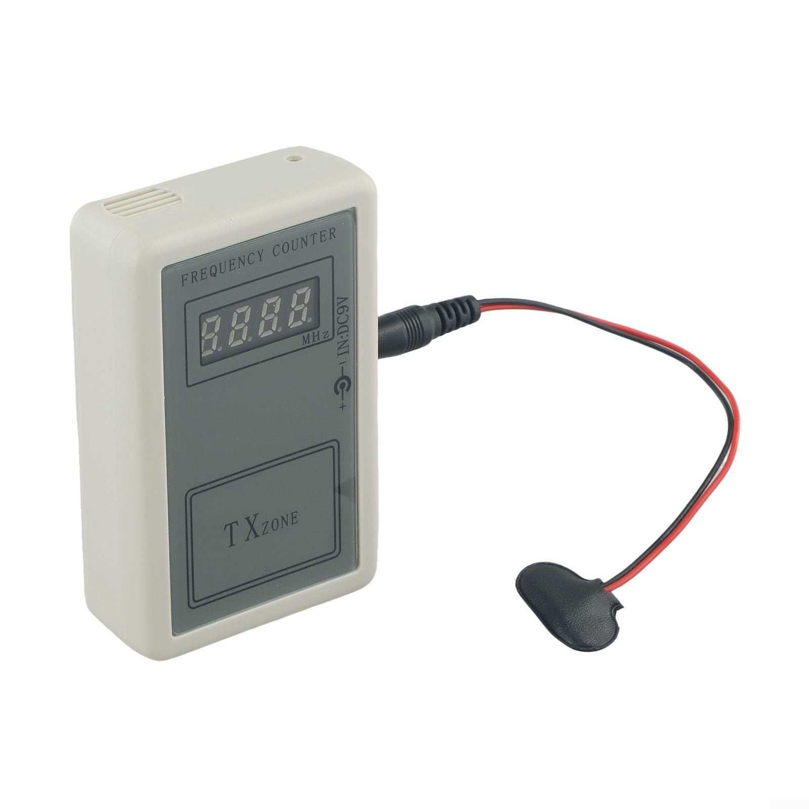 Tester tenuto in mano del contatore di frequenza di rf per i regolatori elettrici della porta ed i antifurto