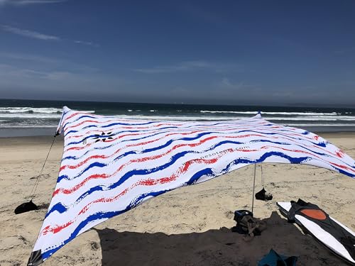 Image of Neso Portable Beach Tent Sun Shelter with Sand Anchor - Lightweight Beach Shade Canopy - Easy Setup for Family Outings - Patented Reinforced Corners - UPF 50+ Sun Protection - 7 x 7ft - USA Waves