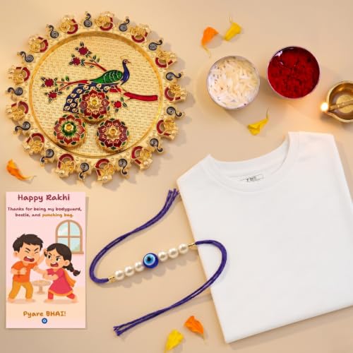 Image of Evil Eye Pearl Rakhi with White T-Shirt & Peacock Designer Pooja Thali Gift Combo for Brother, Nazar Suraksha Rakhi, Greeting Card, Roli Chawal, Raksha Bandhan Gift Set for Bhai
